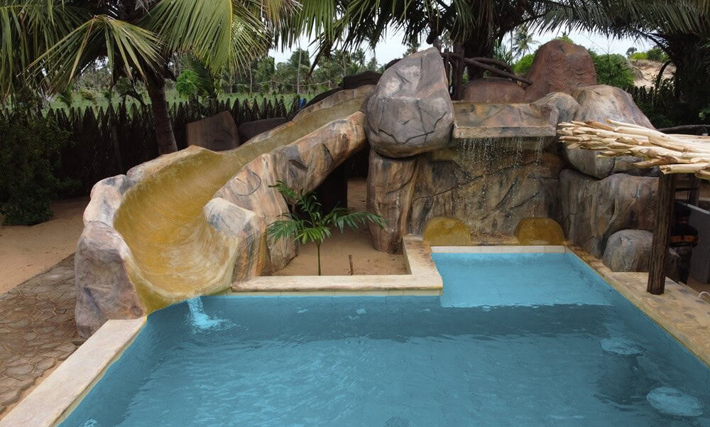 Dune Towers beach resort stylish swimming pool with waterfall